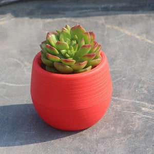 Round plastic plant pot