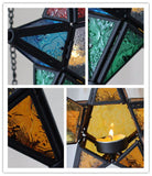 Colorful embossed glass Pentagram iron candlestick wind lamp